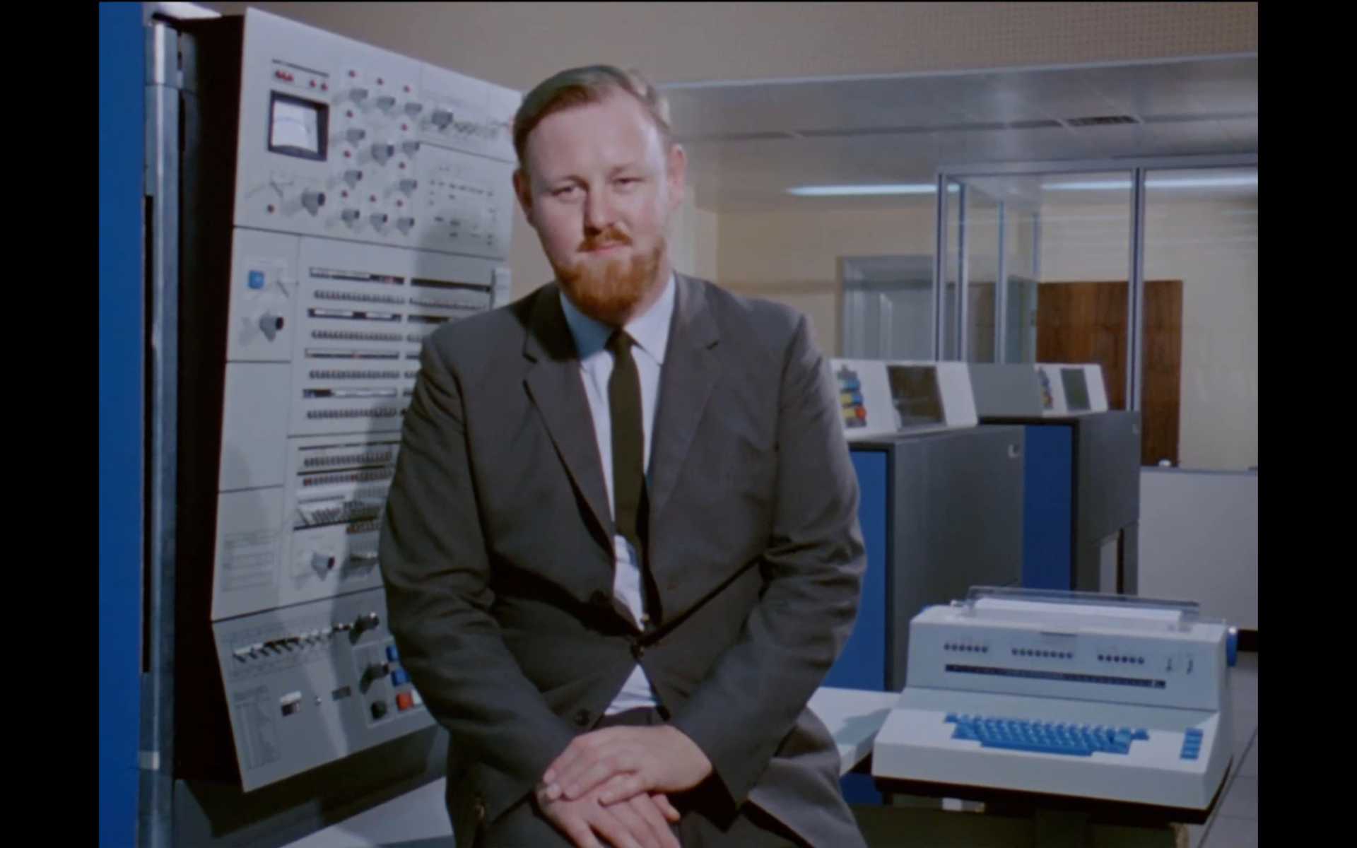 Roger Tomlinson talks about the use of computers for the Canada Land Inventory in 1967. Frame from "Data for Decision", a National Film Board of Canada documentary, directed by Michael Millar.