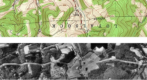 Example of how a linear feature can appear crooked in an aerial photograph that has not yet been orthorectified due to relief displacement. @dibiase_census_2014, CC-BY-4.0.